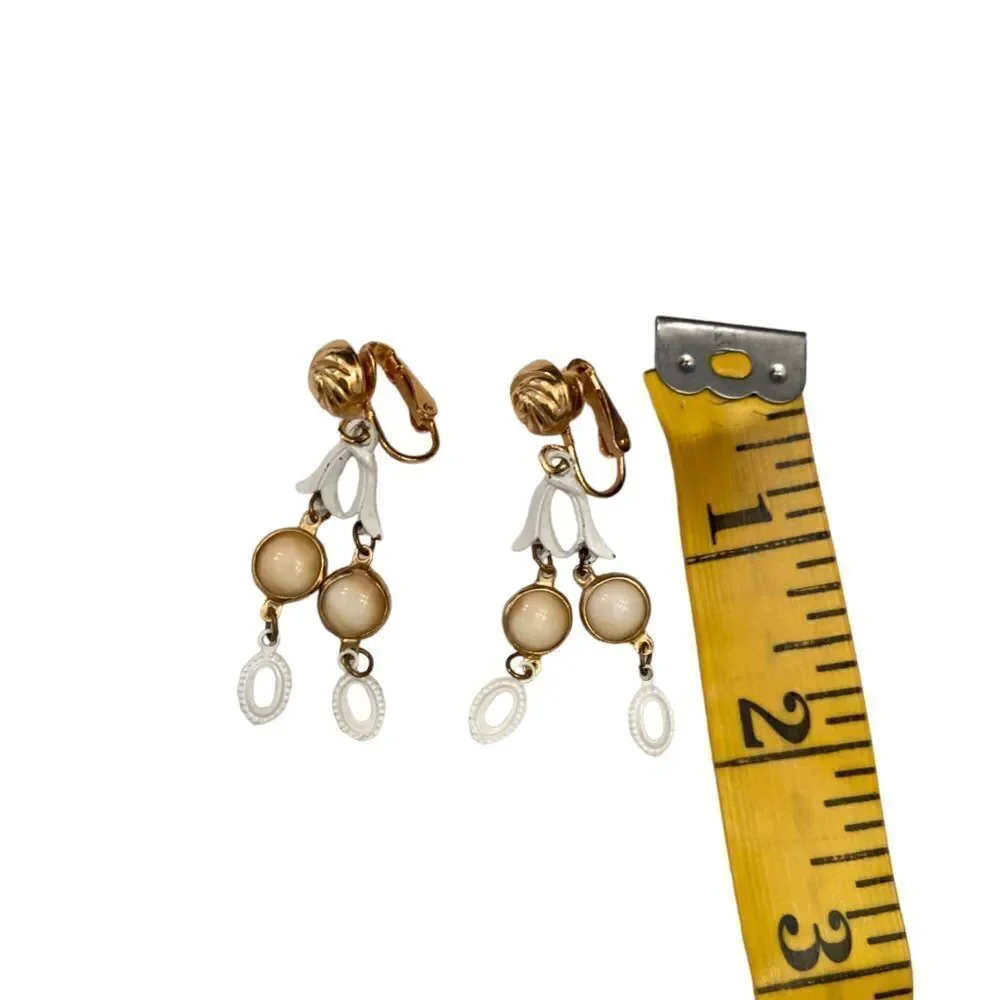 New Vintage 1990’s soft clip on drop earrings gold tone swirl & white enamel